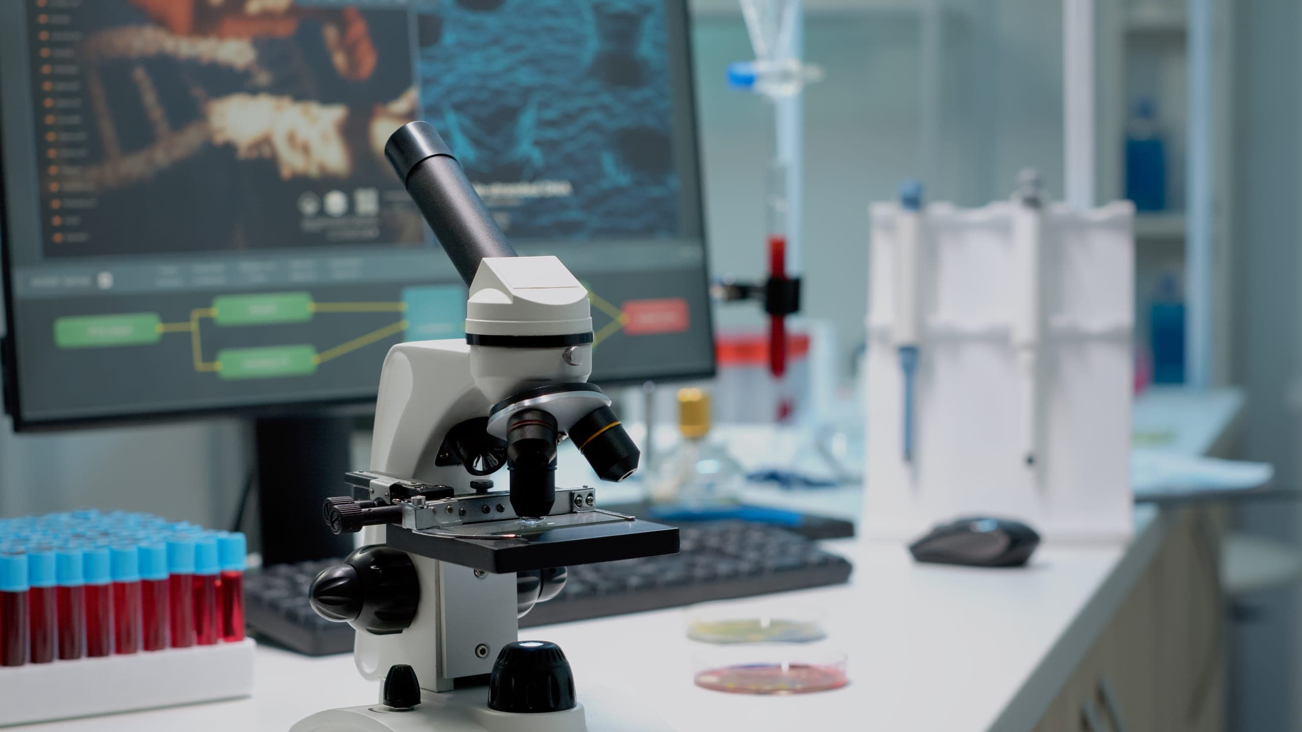 A researcher in a lab coat working at an advanced scientific research station, representing the journey from infrastructure to intelligence.